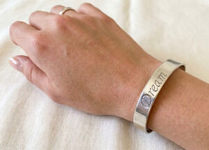 DREAM Stamped Fashion Cuff Silver Bracelet Stainless Steel Metal 6.75” Unisex